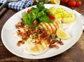 Grilled Plaice Fish Fillet with Bacon and Potatoes Royalty Free Stock Photo