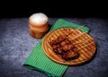 Grilled pork on bamboo skewers placed Royalty Free Stock Photo