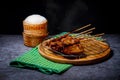 Grilled pork on bamboo skewers placed Royalty Free Stock Photo