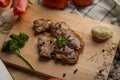 Grilled pork barbecue steak and side dishs on cutting board on table Royalty Free Stock Photo