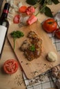 Grilled pork barbecue steak and side dishs on cutting board on table Royalty Free Stock Photo