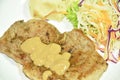 Grilled pork black pepper steak with mashed potato and salad dressing gravy sauce on plate Royalty Free Stock Photo