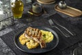 Grilled pork chop with mashed potatoes and cauliflower dinner Royalty Free Stock Photo