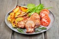 Grilled pork chop on rustic table Royalty Free Stock Photo