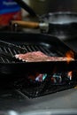 Grilled pork chop .Steak on a frying pan Royalty Free Stock Photo