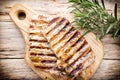 Grilled pork chops pieces. Spices and rosemary. Royalty Free Stock Photo