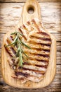 Grilled pork chops pieces. Spices and rosemary. Royalty Free Stock Photo