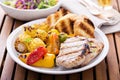 Grilled pork chops with vegetables and bread Royalty Free Stock Photo