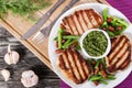 Grilled pork chops on a white dish Royalty Free Stock Photo