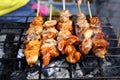 Grilled pork intestine in barbecue sticks sold at a street food stall