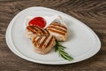 Grilled pork medallion with sauce Royalty Free Stock Photo