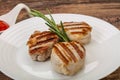 Grilled pork medallion with sauce Royalty Free Stock Photo