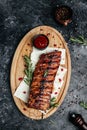 Grilled pork ribs with BBQ sauce. vertical image. top view. place for text Royalty Free Stock Photo