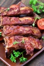 Grilled pork ribs on ceramic plate Royalty Free Stock Photo