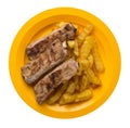 Grilled pork ribs with french fries on a plate. pork ribs with french fries on white background. ribs with potatoes top view