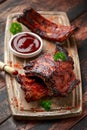 Grilled pork ribs with herbs on wooden board Royalty Free Stock Photo