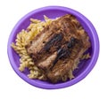 Grilled pork ribs with pasta. grilled pork ribs on a plate isolated on white background top view Royalty Free Stock Photo