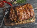 Grilled pork ribs with sauce on a cutting board , spice, marinade Royalty Free Stock Photo