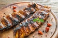 Grilled pork ribs on the wooden board Royalty Free Stock Photo