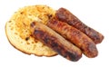 Grilled Pork Sausages On A Buttered Crumpet Royalty Free Stock Photo