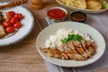 Grilled pork served on top of steamed rice Royalty Free Stock Photo