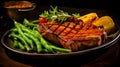 Grilled pork steak with a bone in a sweet honey glaze and vegetable stew with green beans