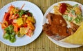 Grilled pork steak dressing gravy and spicy mixed fruit salad Royalty Free Stock Photo