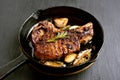 Grilled pork steak in frying pan Royalty Free Stock Photo