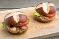 Grilled pork steak sandwich (burger) with mushrooms Royalty Free Stock Photo
