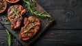 Grilled pork steak with spices on dark background. Royalty Free Stock Photo