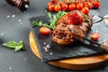 Grilled pork steaks, pork neck with tomatoes, banner, menu, recipe place for text, top view Royalty Free Stock Photo