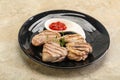 Grilled pork tenderlion with tomato sauce Royalty Free Stock Photo