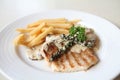 Grilled Porkchop with white sauce Royalty Free Stock Photo