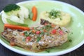 Grilled Porkchop on a plate Royalty Free Stock Photo