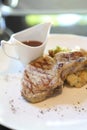 Grilled Porkchop on a plate Royalty Free Stock Photo