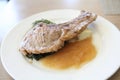 Grilled Porkchop on a plate Royalty Free Stock Photo