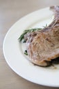 Grilled Porkchop on a plate Royalty Free Stock Photo