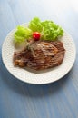 Grilled porterhouse with salad