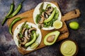 Grilled portobello, asparagus, bell peppers, green beans fajitas. Poblano mushroom tacos with jalapeno, cilantro, avocado crema