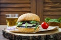 Grilled portobello mushroom burger. Healthy veggies hamburger with onions, arugula, cheese, spicy pickled hot peppers Royalty Free Stock Photo