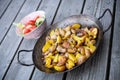 Grilled potatos with onionin and salad