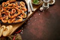 Grilled prawns in cast iron grilling pan with fresh lemon, parsley, chili, garlic white wine sauce Royalty Free Stock Photo