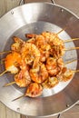 Grilled prawns on wooden skewers, shrimp kebab