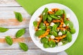 grilled pumpkin, mozzarella, baby spinach and pumpkin seeds salad Royalty Free Stock Photo