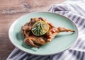 Grilled quail in a honey souce with rosemary.