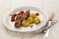 Grilled rabbit leg and potato Royalty Free Stock Photo