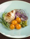 Grilled rabbit with vegetables and tarragon