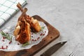 Grilled rack of lamb served on a wooden board Royalty Free Stock Photo