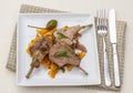 Grilled racks of lamb with carrot, capers Royalty Free Stock Photo