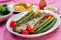 Grilled rainbow trout with asparagus Royalty Free Stock Photo